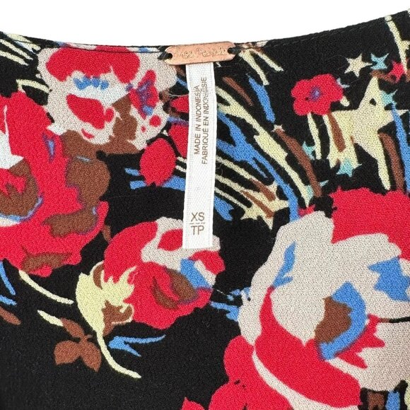 Free People BACK TO BASICS Black Floral & Stars Wrap Tunic Top Size XS Blouse - Picture 4 of 5